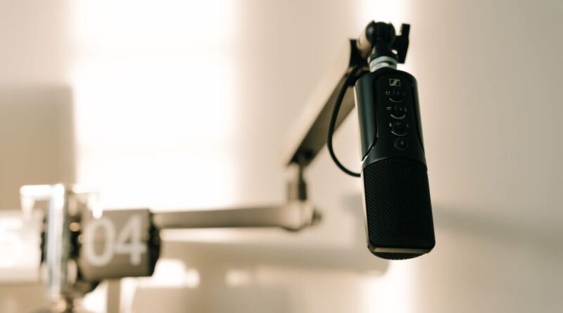 A condenser microphone on a boom arm in a studio, illustrating the best AI podcasts for listeners choosing a show.