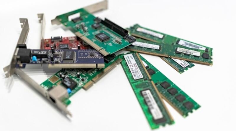 Close-up of a green printed circuit board, illustrating the OpenAI Jalapeño chip power efficiency gains