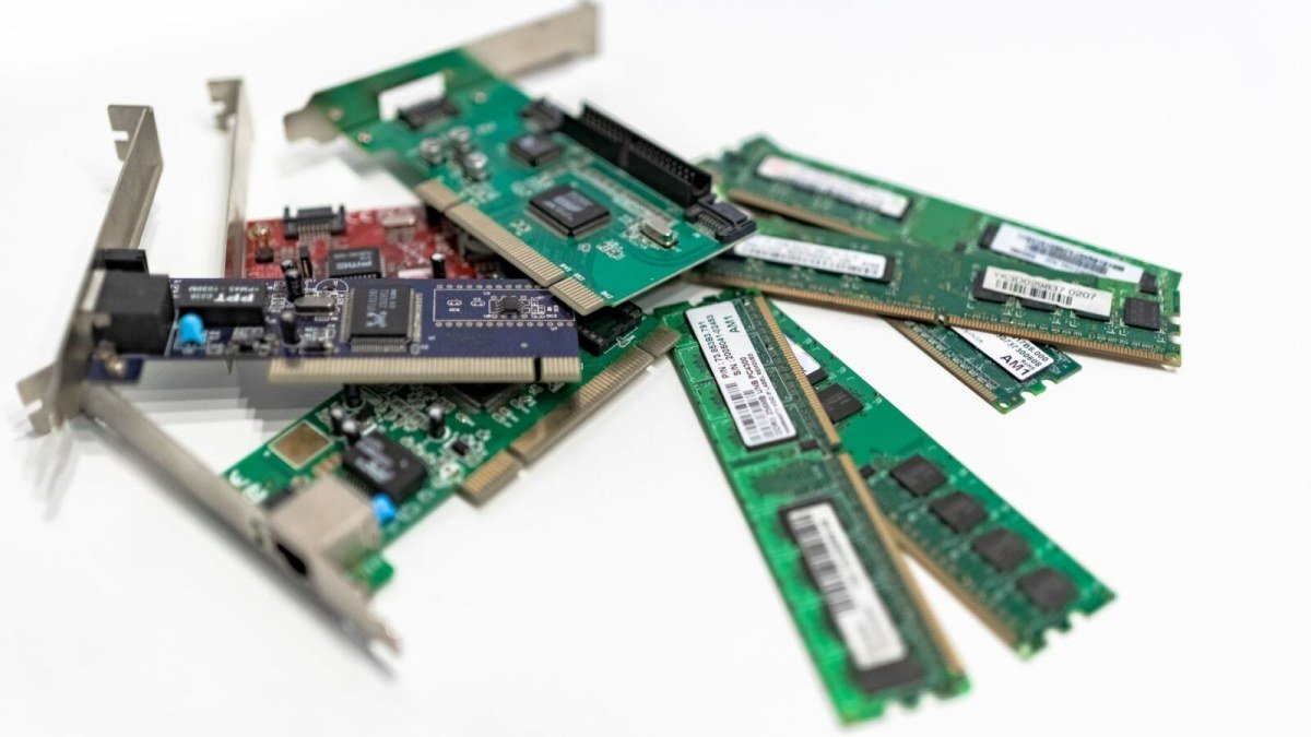 Close-up of a green printed circuit board, illustrating the OpenAI Jalapeño chip power efficiency gains