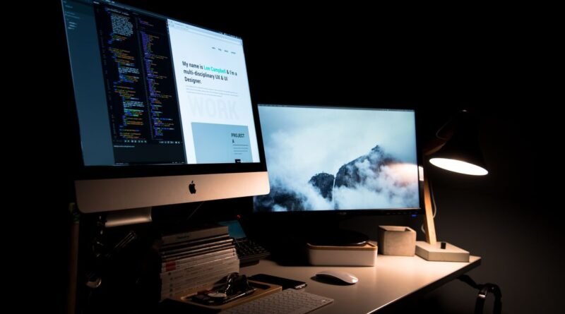 A tidy desk with dual monitors, the setup used to build an AI agent