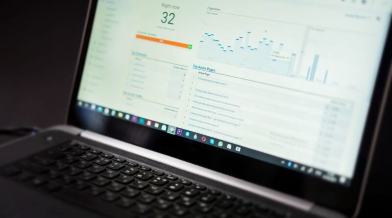 Analytics dashboard on a laptop, the kind of ordinary software that AI washing rebrands