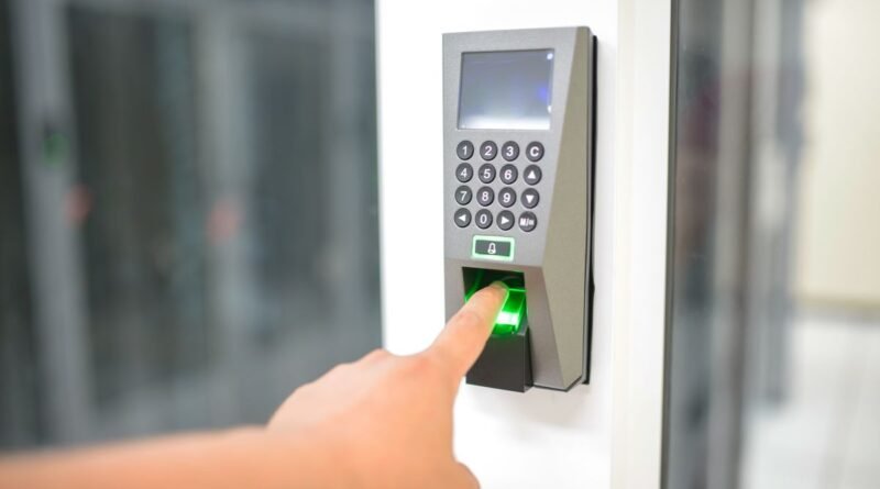 A fingerprint scanner used for secure entry, the identity check behind AI text watermarking
