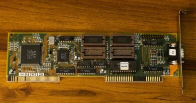 A vintage circuit board on wood, a reminder that hardware decides whether you can run an LLM locally