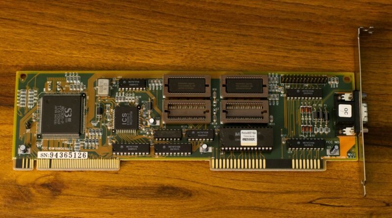 A vintage circuit board on wood, a reminder that hardware decides whether you can run an LLM locally