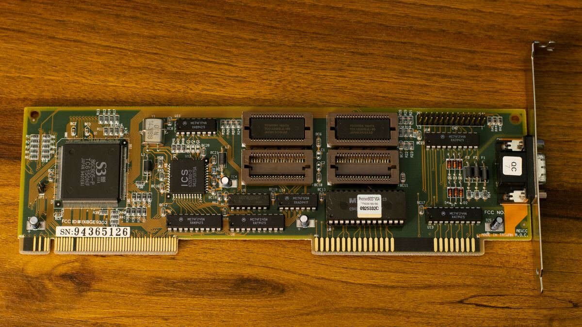 A vintage circuit board on wood, a reminder that hardware decides whether you can run an LLM locally