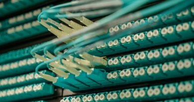 Fibre optic cables into a server rack, the plumbing of AI agent infrastructure funding
