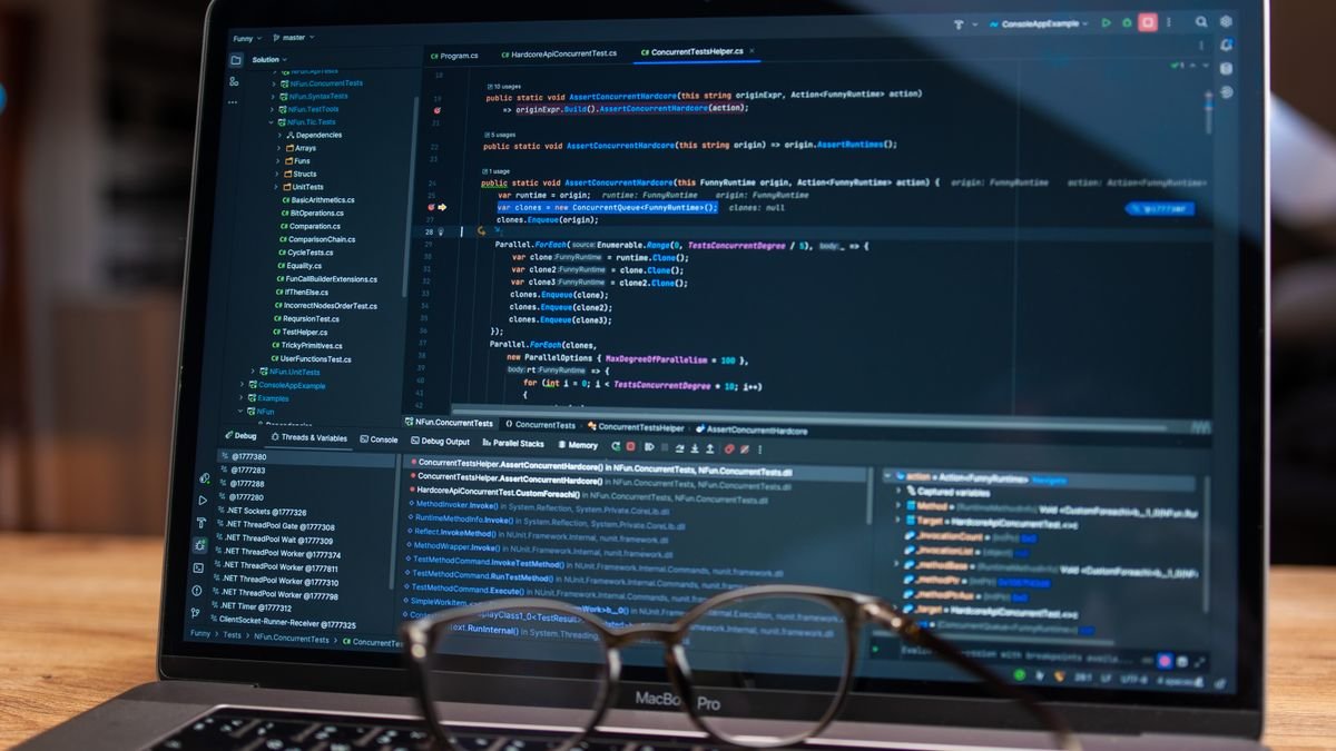 A laptop showing debugging software, the kind of work Thinking Machines Inkling targets