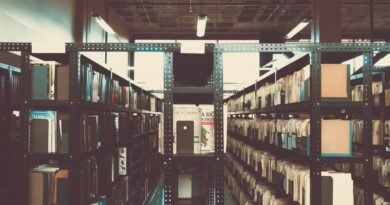 Library bookshelves in a vintage tone, the retrieval problem behind pgvector vs a dedicated vector database