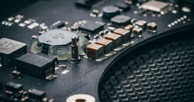 A macro shot of an electronic circuit board, at the centre of the AI compute shortage