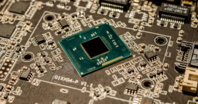 A microchip on a circuit board, the hardware behind flagship vs entry tier models