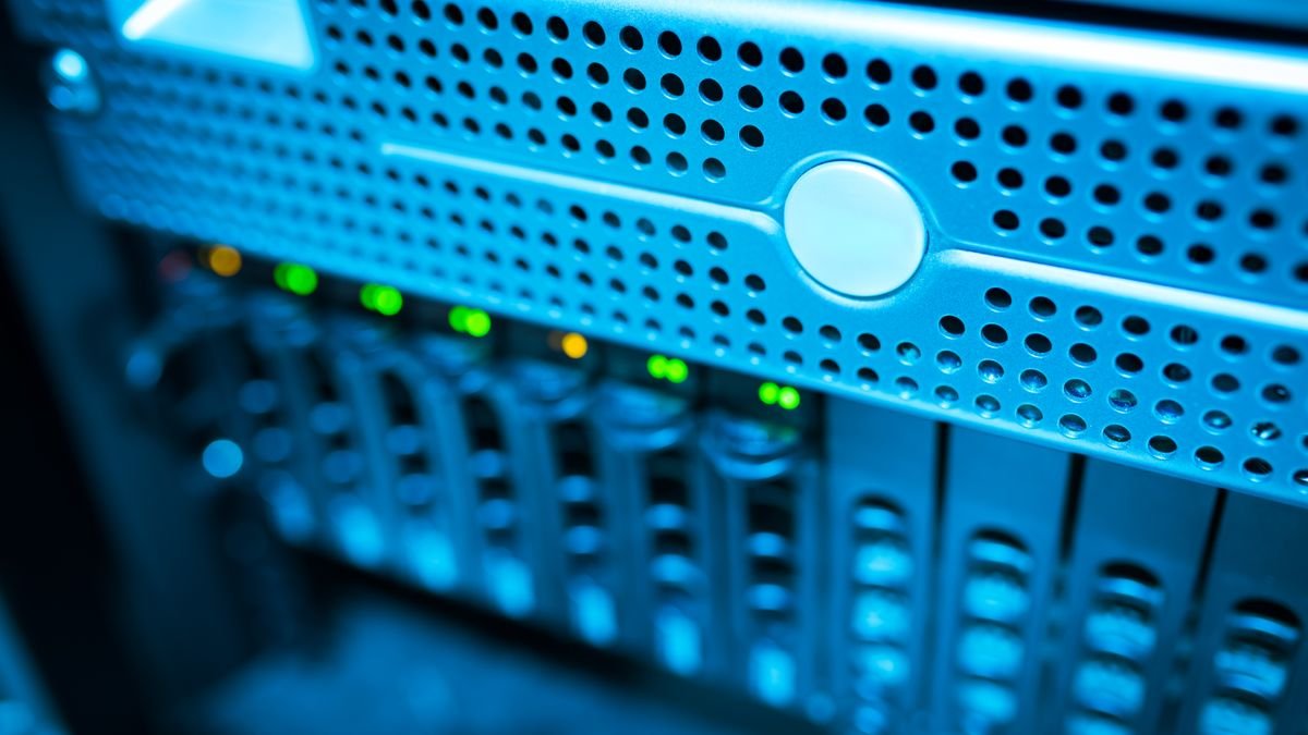 A data server rack with blinking lights, running through another AI model release cycle