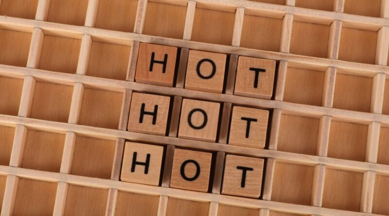Wooden letter tiles spelling a word on a grid, the unit-splitting that tokenisation performs