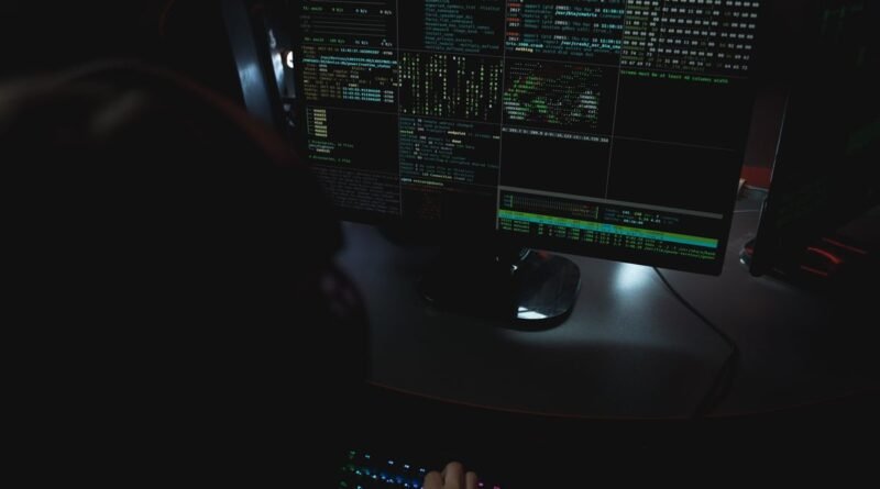 Code on monitors in a darkened room, the environment Meta Muse Code writes into
