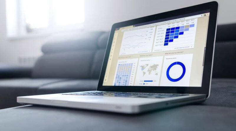 A laptop showing analytics and graphs, the presentation layer of AI benchmarks
