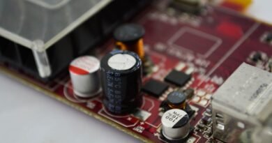 Capacitors and chips on a circuit board, the local hardware Ollama vs llama.cpp vs vLLM runs on