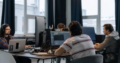 Developers working together in a tech office, the team behind the Cognition valuation