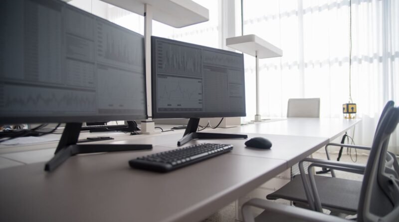 Rows of monitors in a contemporary office, the buyers Meta enterprise AI is aimed at