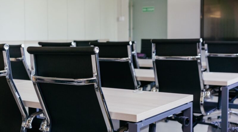 An empty modern conference room, standing in for the Google DeepMind leadership reshuffle