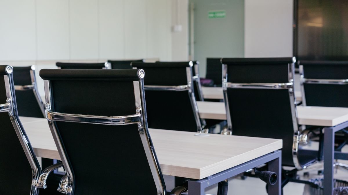 An empty modern conference room, standing in for the Google DeepMind leadership reshuffle