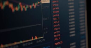 Close-up of a dark trading monitor showing price quotes, illustrating the Anthropic Nscale deal