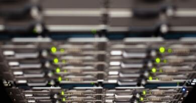 Server rack illustrating OpenAI pauses AI training over Astra cyber risk