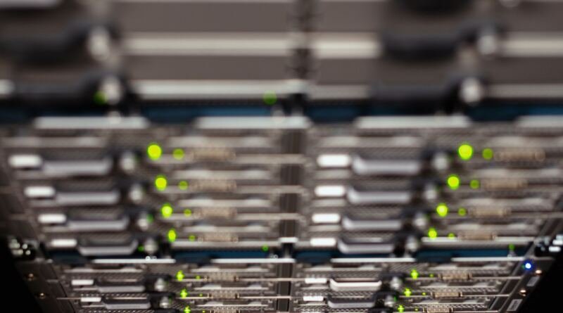 Server rack illustrating OpenAI pauses AI training over Astra cyber risk