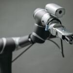 Robotic arm, illustrating agentic data operations platform (adop): data engineering into hours