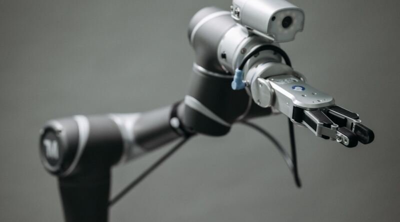 Robotic arm, illustrating agentic data operations platform (adop): data engineering into hours