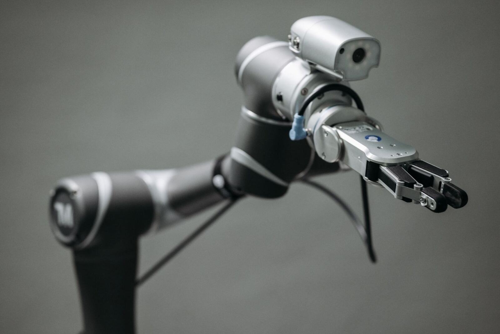 Robotic arm, illustrating agentic data operations platform (adop): data engineering into hours