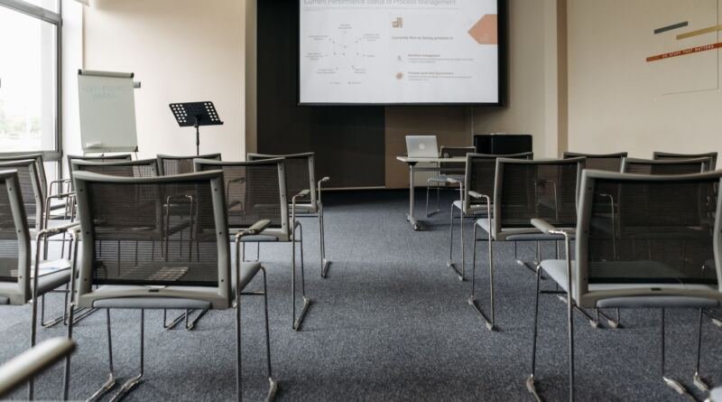 An empty conference room, illustrating the OpenAI preparedness team disbanding