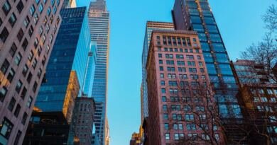 Manhattan skyscrapers under a clear sky, the kind of data center real estate Starcloud's orbital data centers are built to bypass