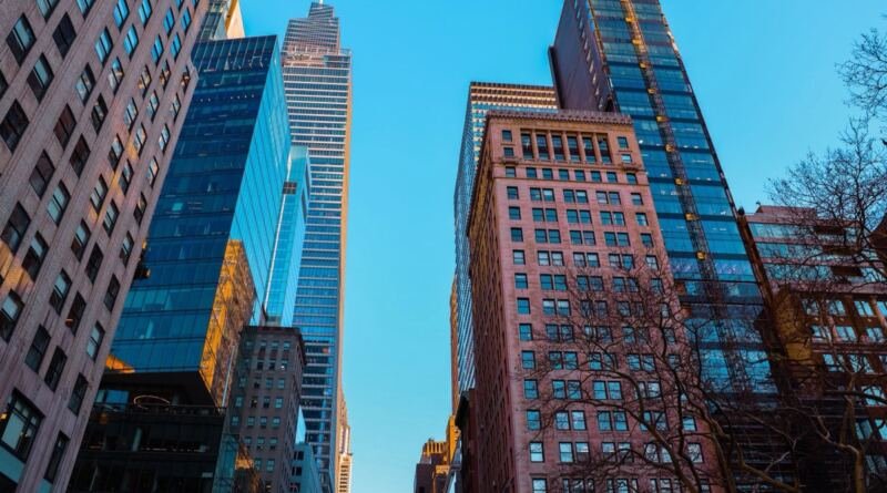 Manhattan skyscrapers under a clear sky, the kind of data center real estate Starcloud's orbital data centers are built to bypass