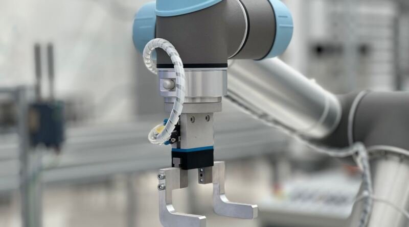 Industrial robot arm standing in for Apple's Agent Seer benchmark of 337 agent test scenarios