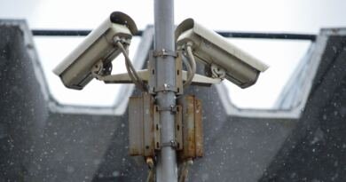 Surveillance camera artwork illustrating why Anthropic and OpenAI need independent embedded AI evaluators