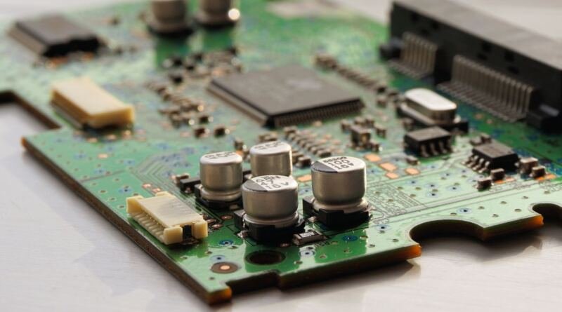 Circuit board illustrating the EU Commission designating ChatGPT, Reddit and Roblox under the Digital Services Act