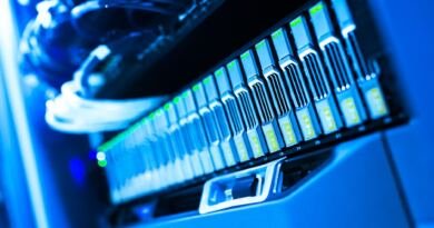 Server rack illustrating the Claude Opus 5.5 pricing cut as OpenAI also halves GPT-6 Sol and Luna prices