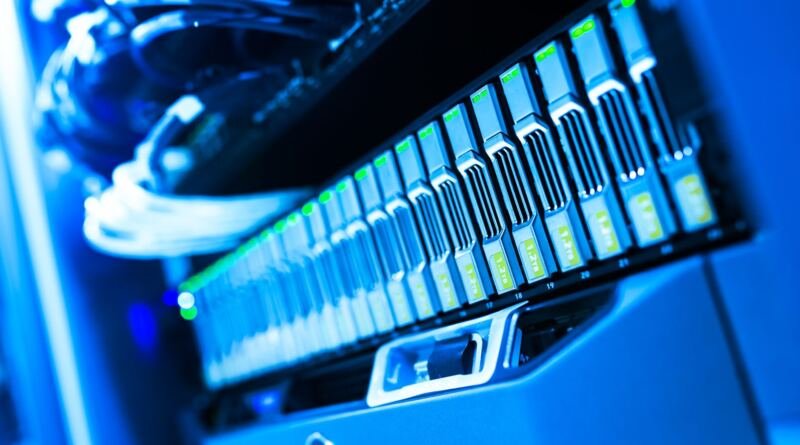 Server rack illustrating the Claude Opus 5.5 pricing cut as OpenAI also halves GPT-6 Sol and Luna prices