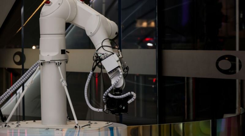 Robotic arm, illustrating the AppWorld consistency gap: will it ace the task again?