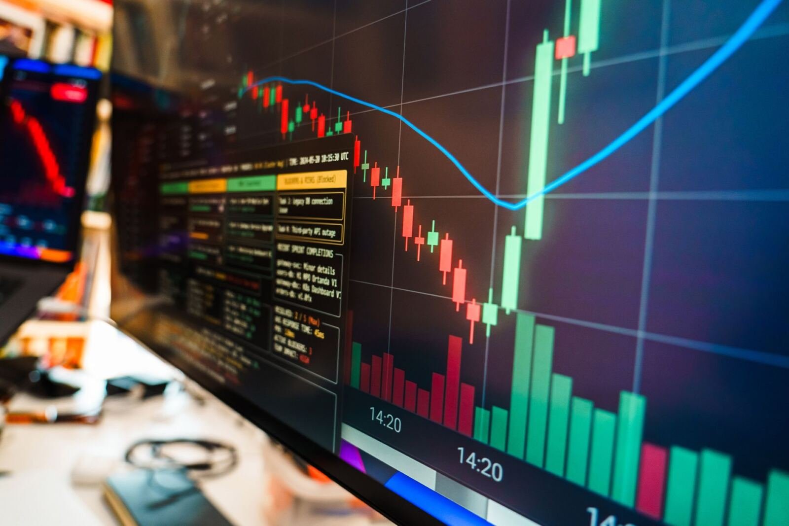 A screen of financial market data showing price quotes in green and red.