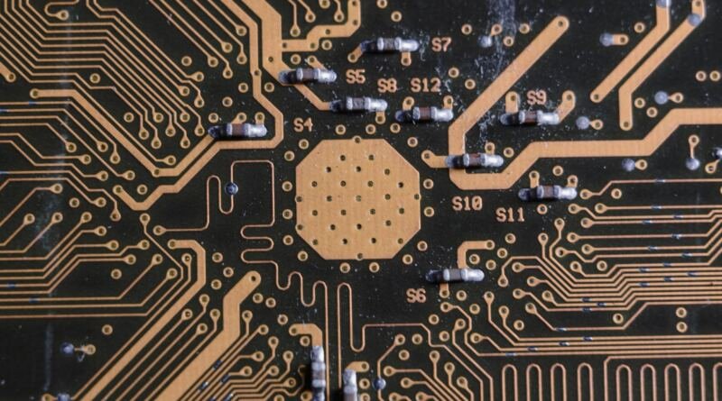 Circuit board illustrating TypeSafe AI Jev, the typed-decision model behind the $40M stealth exit