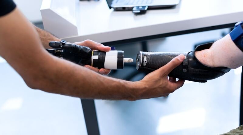 Robotic arm in a workshop, illustrating RTX Spark laptops that run AI models locally on Windows