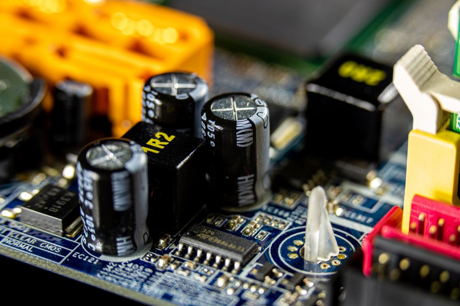 Circuit board illustrating the Apple bilingual speech model and the two separate models behind its three gains