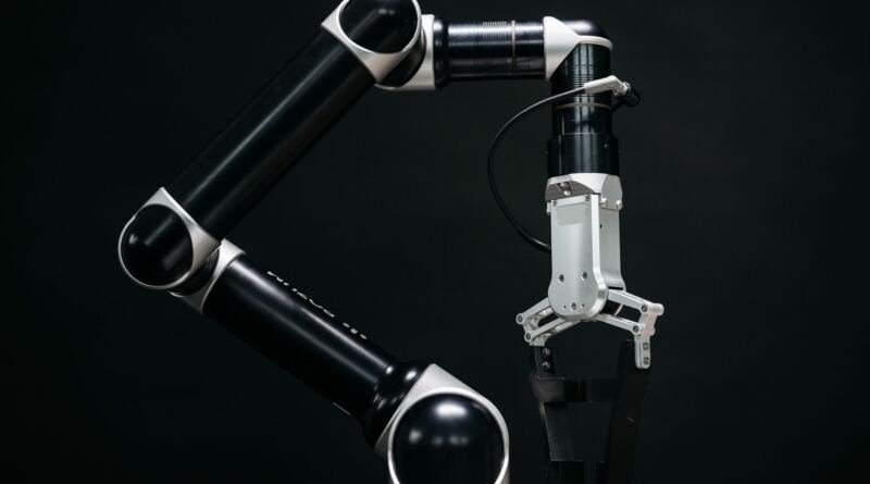 Robotic arm illustrating ServiceNow AutoSynthData generating ITSM agent training data