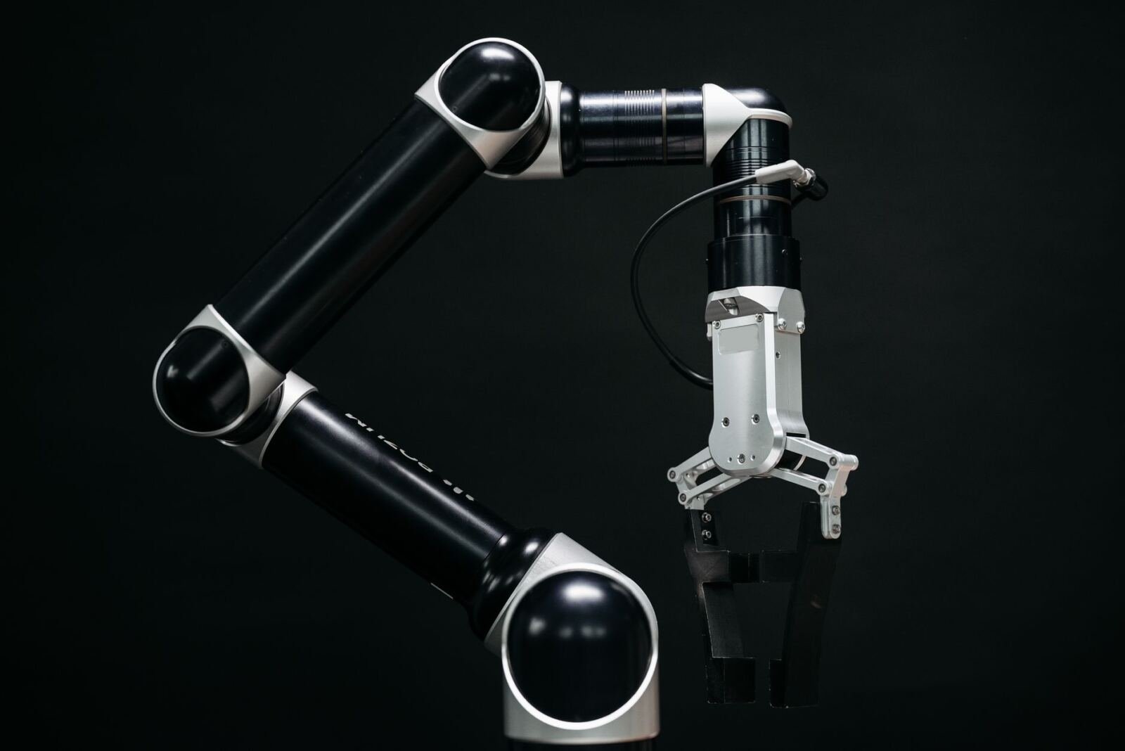 Robotic arm, illustrating autosynthdata: generating training data for enterprise agents
