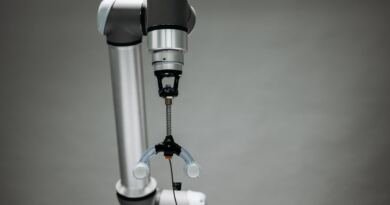 Robotic arm illustrating OpenAI Dots Europe, locked out for Pro subscribers in the EEA and UK.