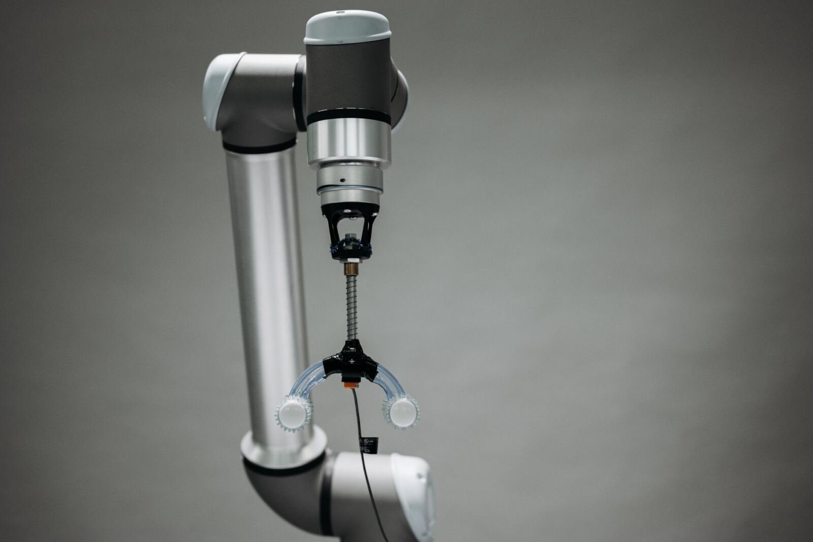 Robotic arm, illustrating the battle to be your personal ai agent is here