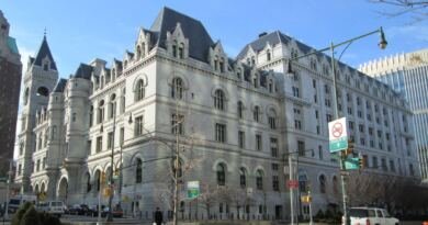 Stone federal bankruptcy courthouse on a city corner, illustrating the Disney Character.AI deal